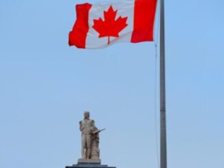 montreal-architecture-with-statue-canada-national-flag_649448-4681