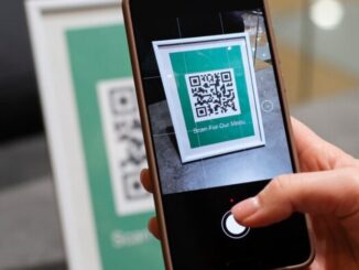 person-scanning-qr-code_23-2149321697